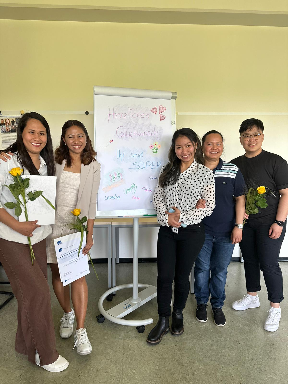 Gruppenbild UKE vor Flipchart